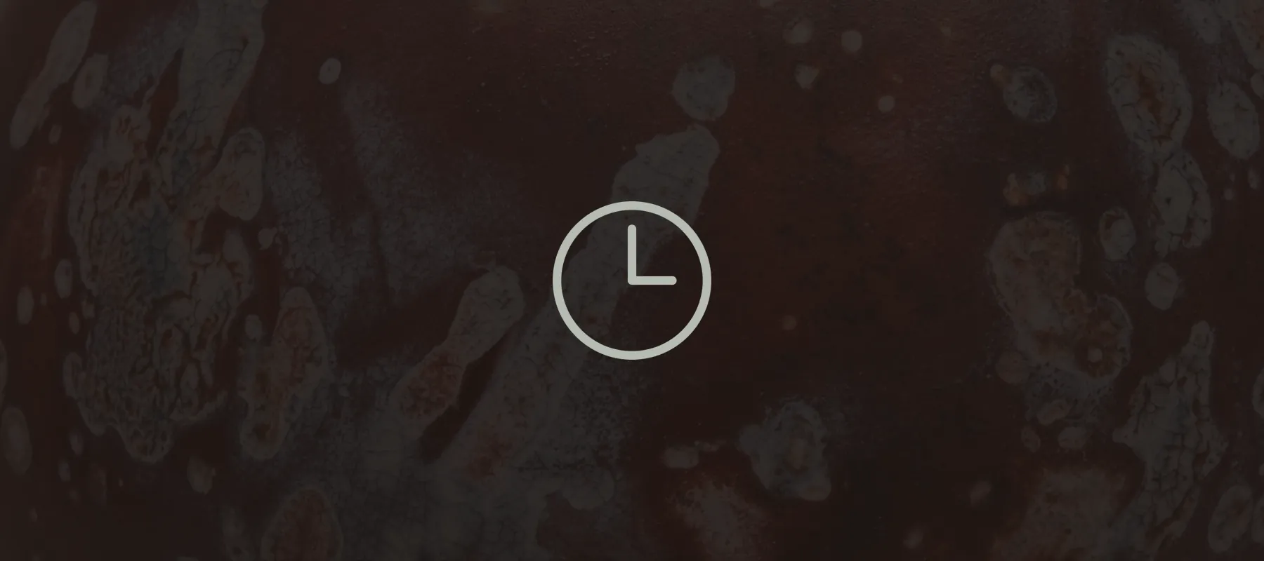 A clock representing queued agent launches